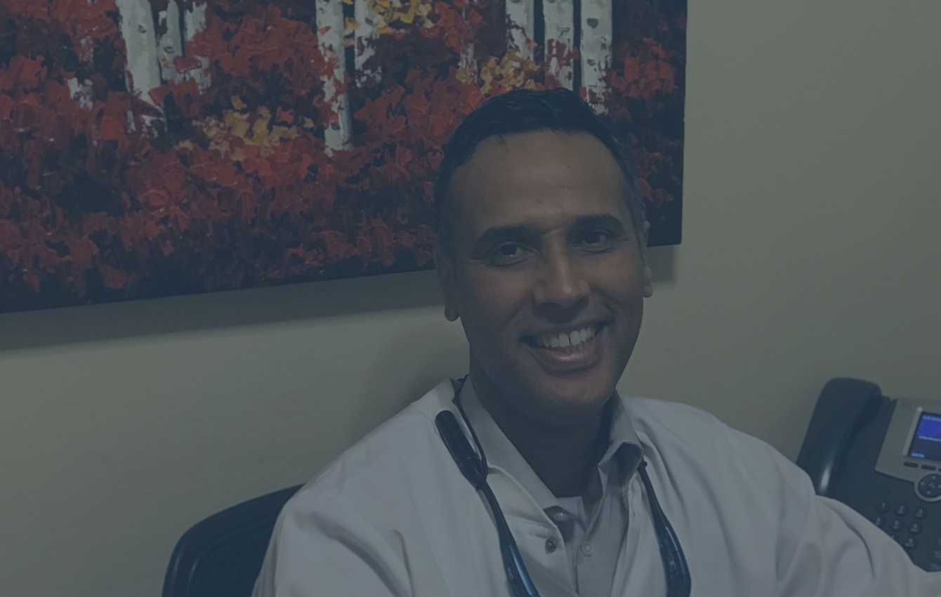 Jacksonville dentist Doctor A Faris Waheed smiling in dental office